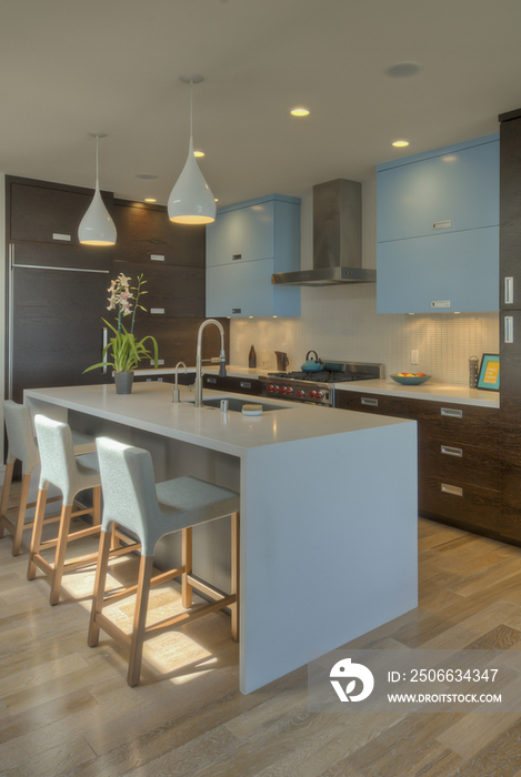 Blue breakfast bar and cabinets in contemporary house; San Francisco; California; USA