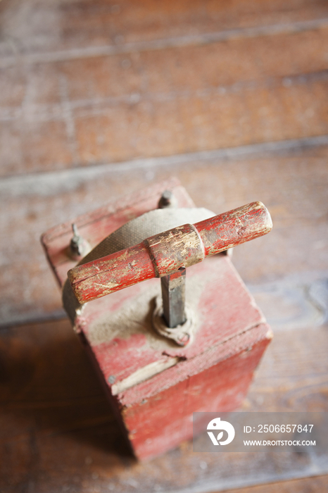 A quarrying and construction tool on a wooden floor