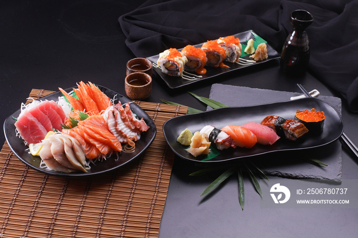 Sashimi and sushi Japanese food set. Salmon, Ikura, wasabi, fish, shrimp and tuna.