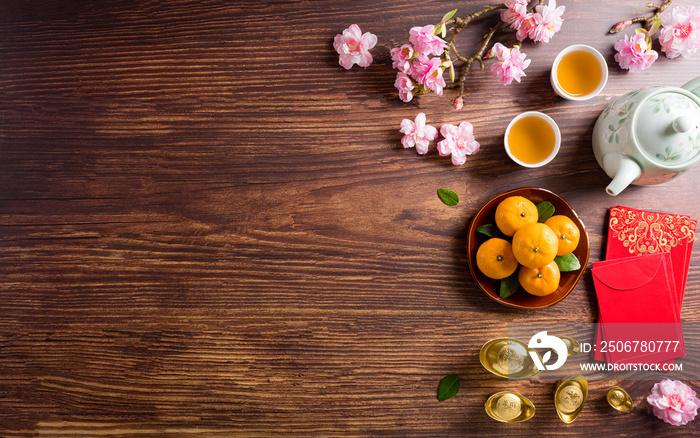 Top view for Happy Chinese new year or Lunar new year festival decorations on old wooden background.