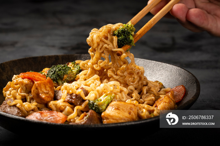 Yakisoba noodles. Yakisoba dish with meat, chicken and vegetables.