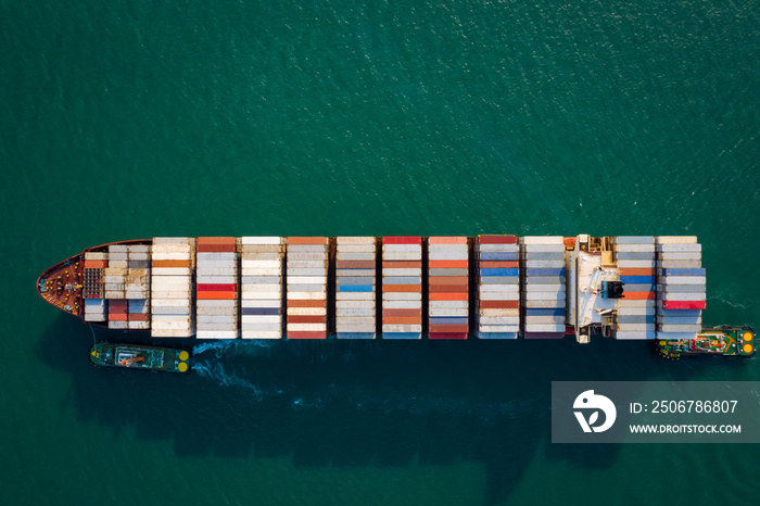 Aerial top view from drone, Container ship  sailing on the green sea