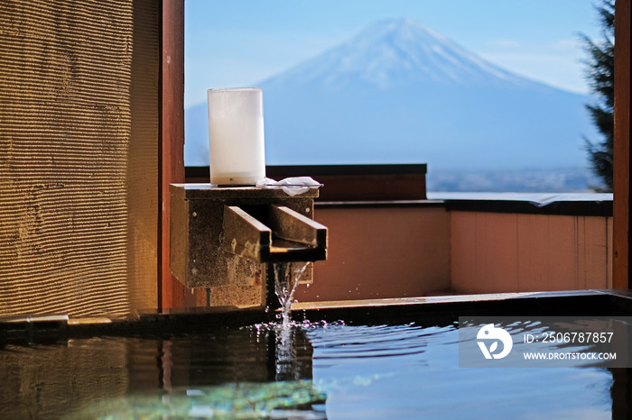 Outdoor hot-spring bath with the beautiful view of Mountain Fuji and Lake Kawaguchiko in Japan