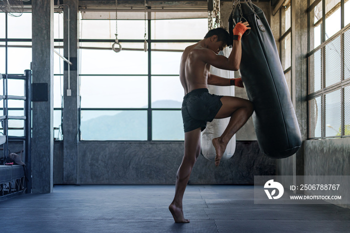 Fighter is practicing in boxing gym, Thai boxing, Martial arts