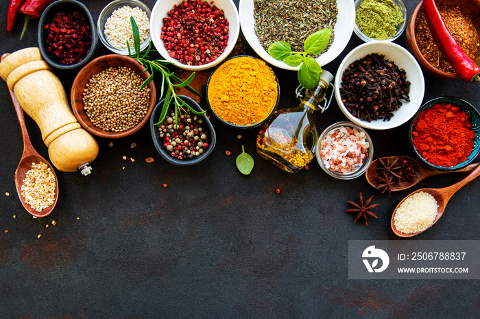 Assortment of spices on black