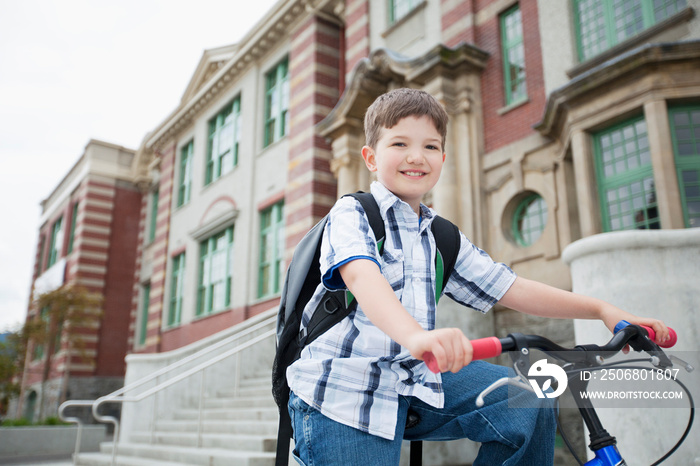 Elementary student biking to school