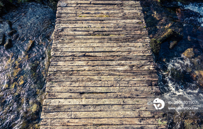 Rickety Footbridge Over Stream