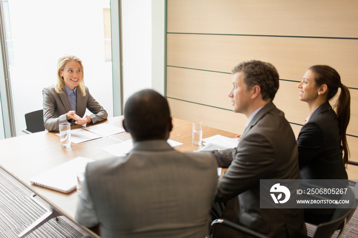 Businesswoman interviewing for job in conference room