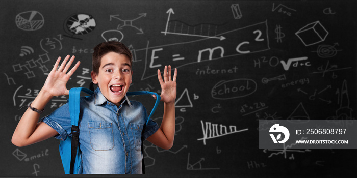 student boy with school backpack and slate with formulas