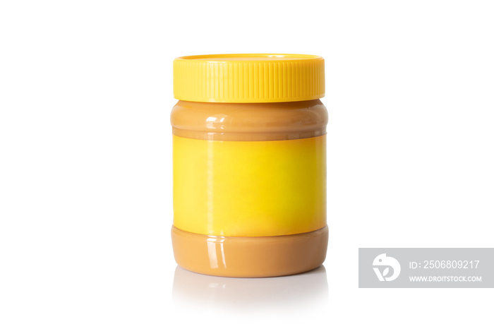 Jar of creamy peanut butter with yellow cap and yellow label isolated on white background. Mock up