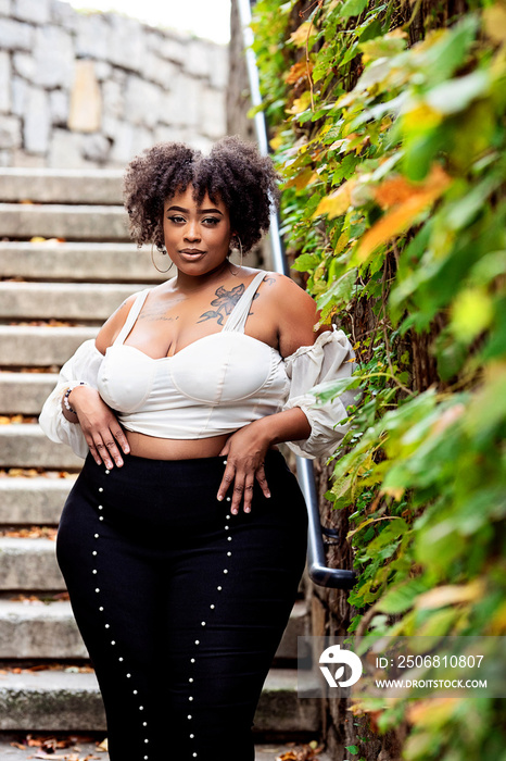 Plus size fashion forward Black woman outside