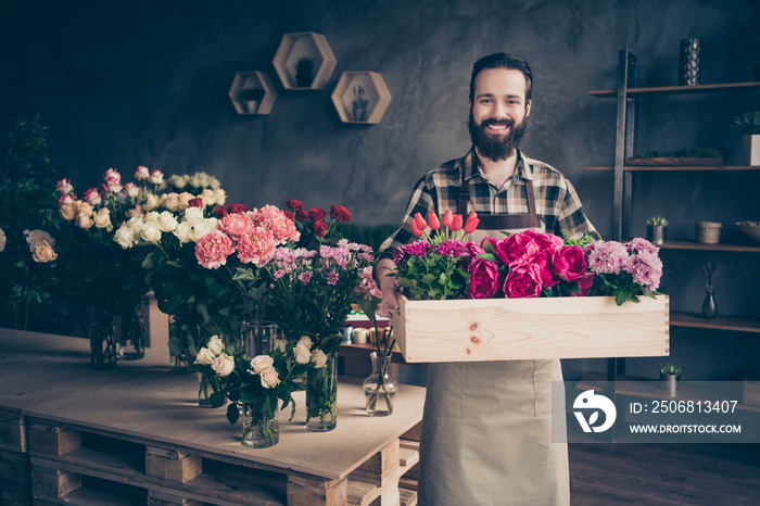 Portrait of his he nice attractive cheery cheerful content successful guy professional gardener hold