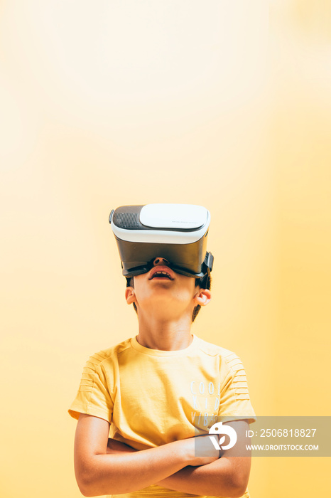 Little boy with virtual reality glasses