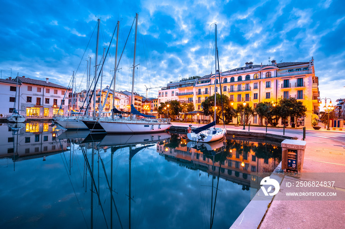 Town of Grado on Adriatic coast harbor and architecture dawn view