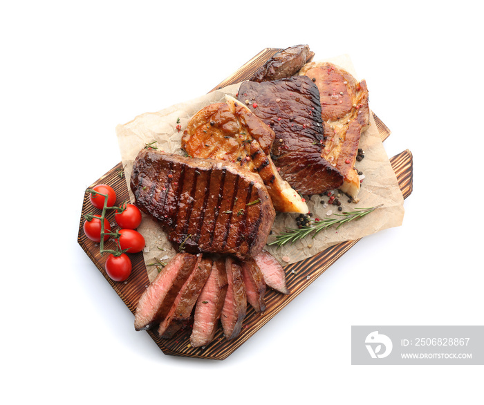 Wooden board with different tasty cooked meat on white background