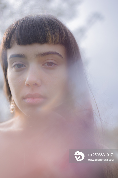 Portrait of Woman in nature background