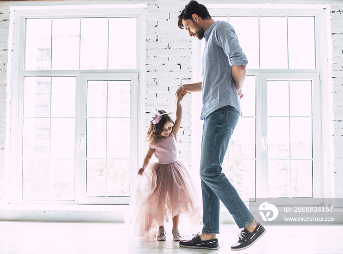 Dad with daughter at home