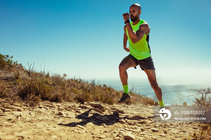 Sportsman running in the mountains