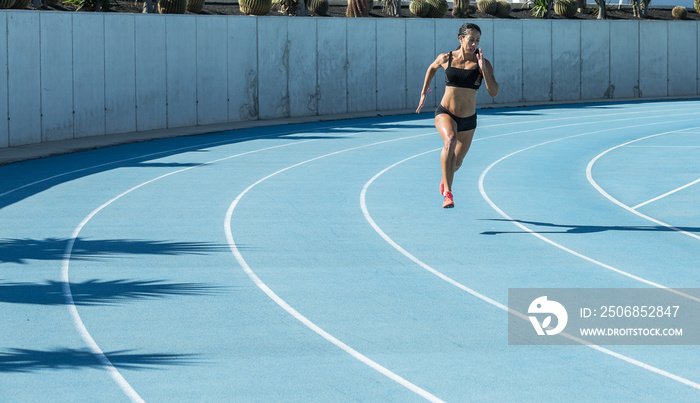 athlete woman on road on running track