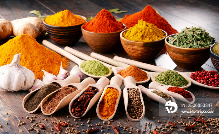 Variety of spices and herbs on kitchen table