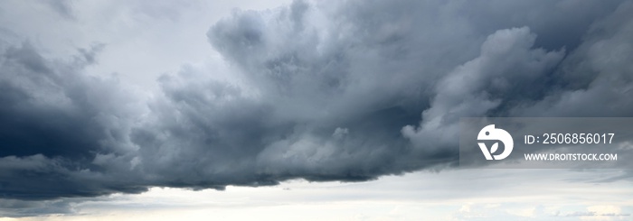 Ornamental clouds. Dramatic sky. Epic storm cloudscape. Soft sunlight. Panoramic image, texture, bac