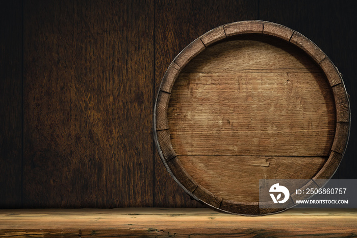 Wooden barrel and worn old table of wood.