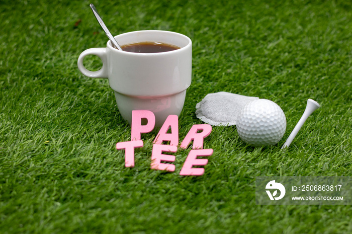 Golf par tee with golf ball and tee on green grass