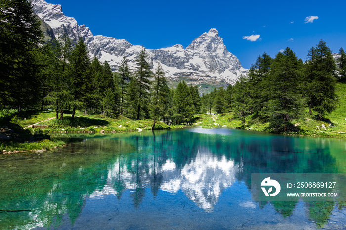 Amazing view of the Matterhorn (Cervino) reflected on the Blue Lake (Lago Blu) near Breuil-Cervinia,