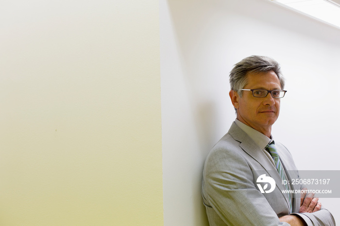 Portrait confident mature corporate businessman in suit