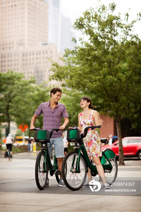 Two friends using bike share