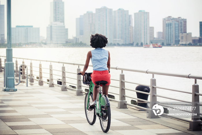 Mid-adult woman cycling