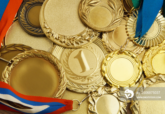 Golden medals as background