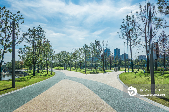 Cyclinng hiking running path road way in the summer park