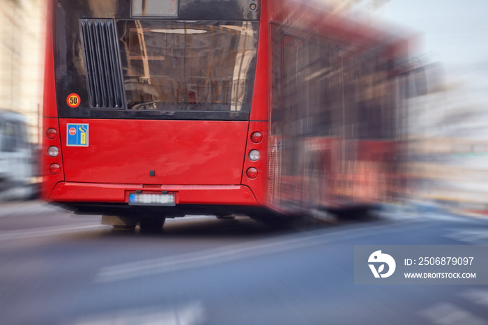 Public transportation / bus in urban surroundings on the street.