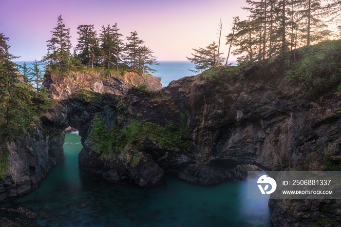 Dusk at Natural Bridges along Samuel H. Boardman State Scenic Corridor, Oregon during a golden hour 