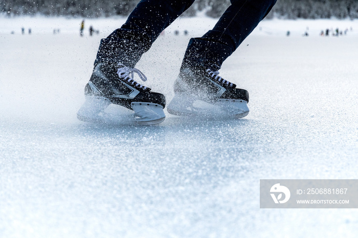 braking ice skates on frozen lake