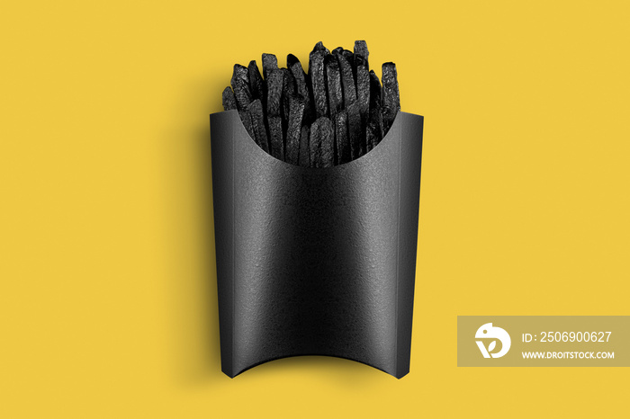 Painted in black french fries with packing. Painted food concept poster on yellow. Black friday sale