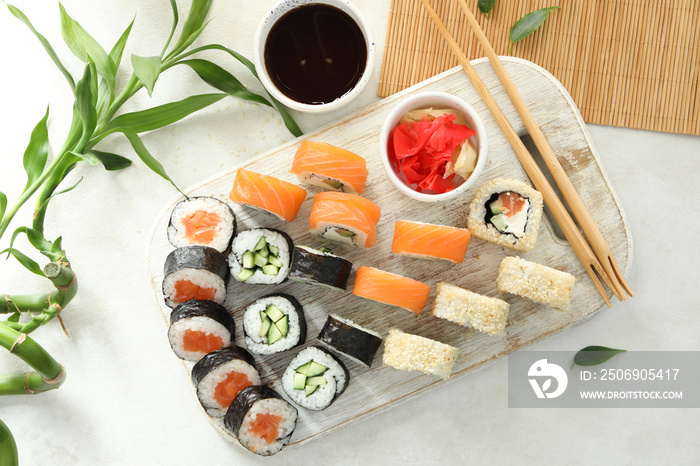 Concept of tasty food with sushi rolls, top view