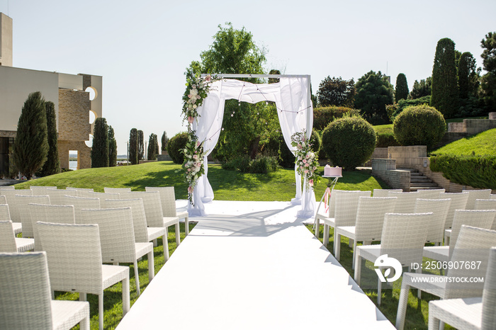Beautiful outgoing wedding set up. Jewish Hupa  on romantic wedding ceremony , wedding outdoor on th