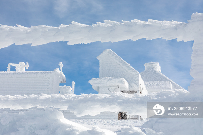 TV and radio antennas known as La Bola del Mundo in Navacerrada, Madrid, Spain, on a snow-covered mo