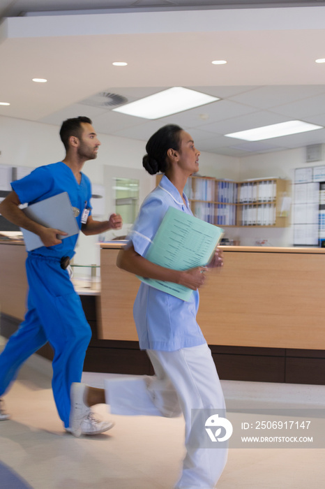 Doctor and nurse running in hospital emergency