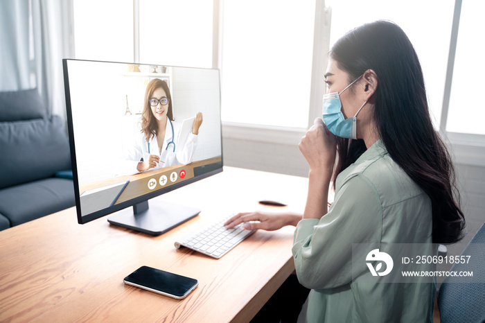 Asian woman patient in an online video call with a professional doctor examining diagnosing disease 