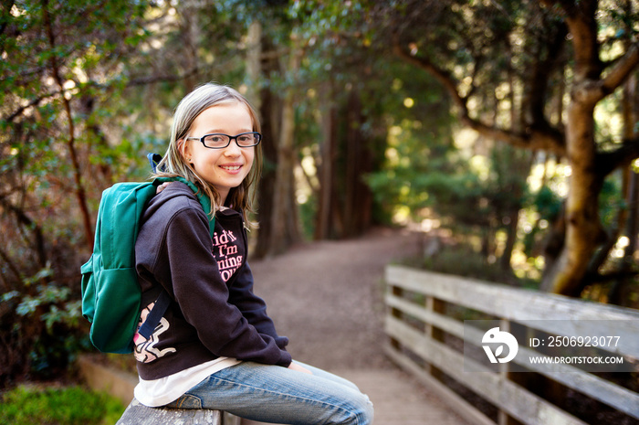 Portrait of girl (10-11) hiking