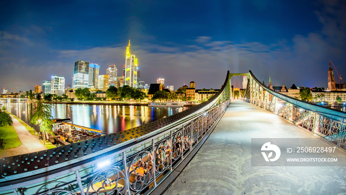 Skyline of Frankfurt with the river Main at night