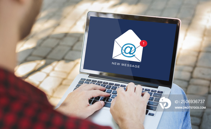 Unrecognizable Guy Using Laptop Reading New E-Mail Message Sitting Outdoor