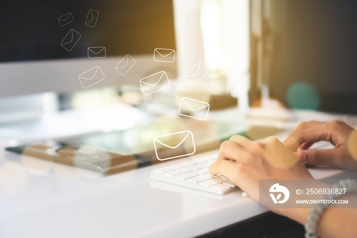 Woman hand using smartphone to send and recieve email for business.