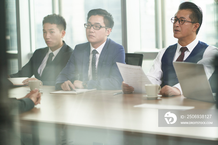 asian HR people conducting interview in meeting room