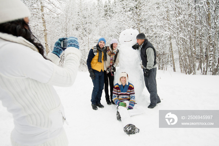 picture taking with snowman