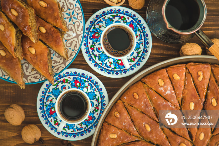 Baklava on the table and Turkish coffee. Selective focus.