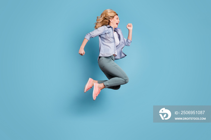 Full size profile side photo of cheerful lady shouting running moving wearing pants trousers isolate